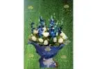 Can I send custom greeting cards with my flower delivery in Janakpuri?
